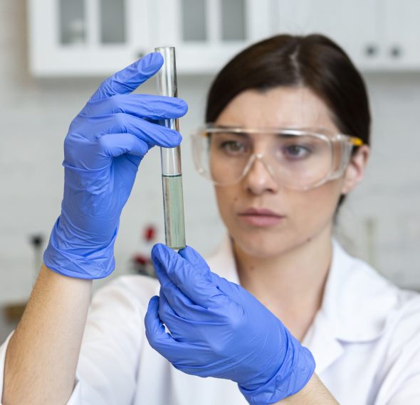 female-researcher-with-safety-glasses-test-tube-min female-researcher-with-safety-glasses-test-tube-min
