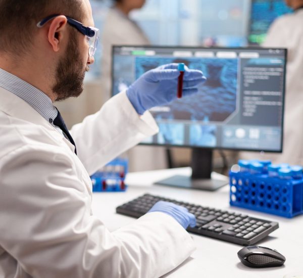 genetic-scientist-studying-epidemics-holding-sample-blood-min genetic-scientist-studying-epidemics-holding-sample-blood-min